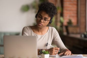 Woman doing Belbin elearning Woman doing Belbin elearning